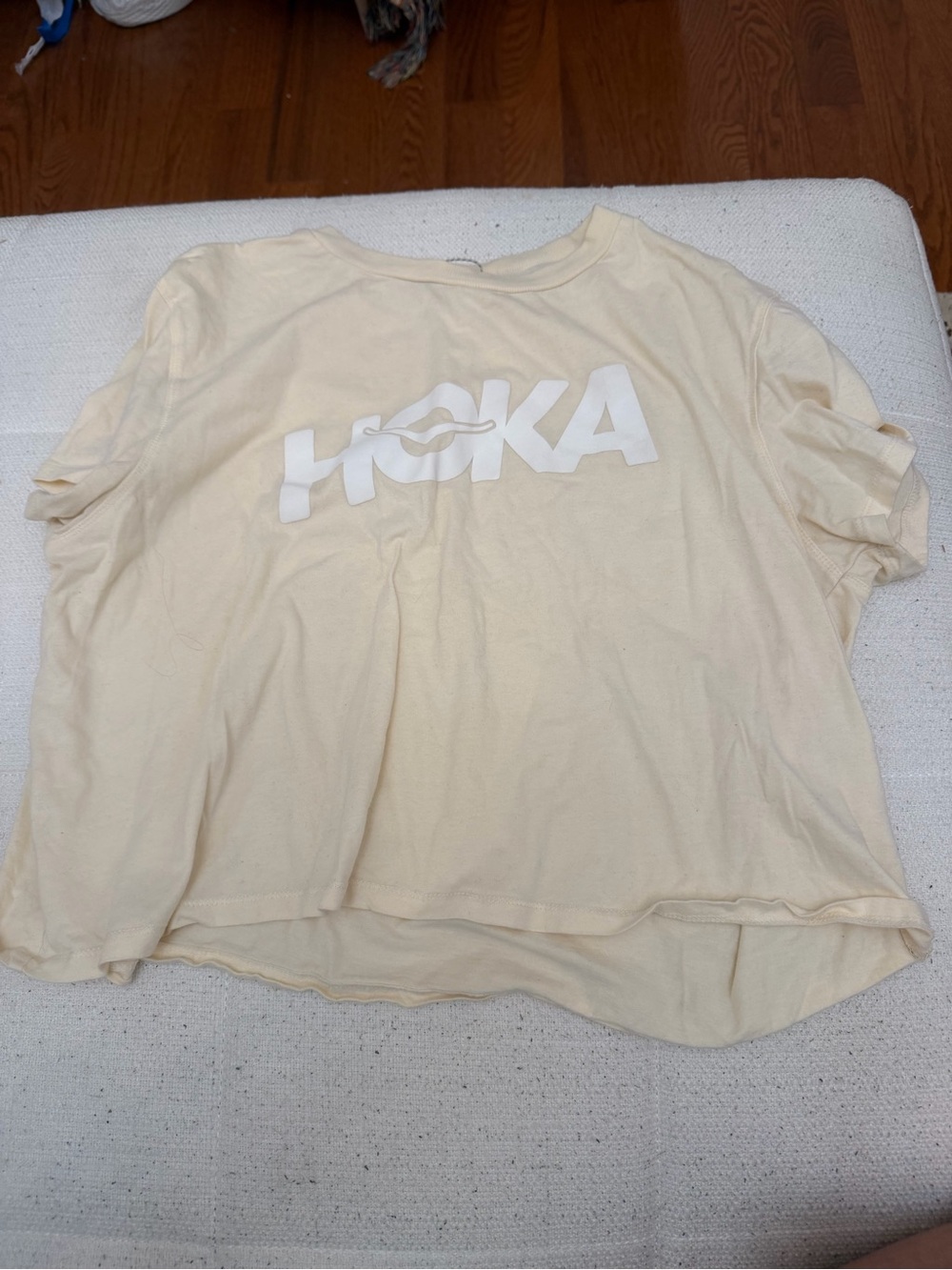 Hoka light yellow graphic logo cropped short sleeve shirt